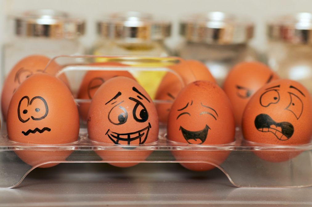 eggs with faces drawn on them