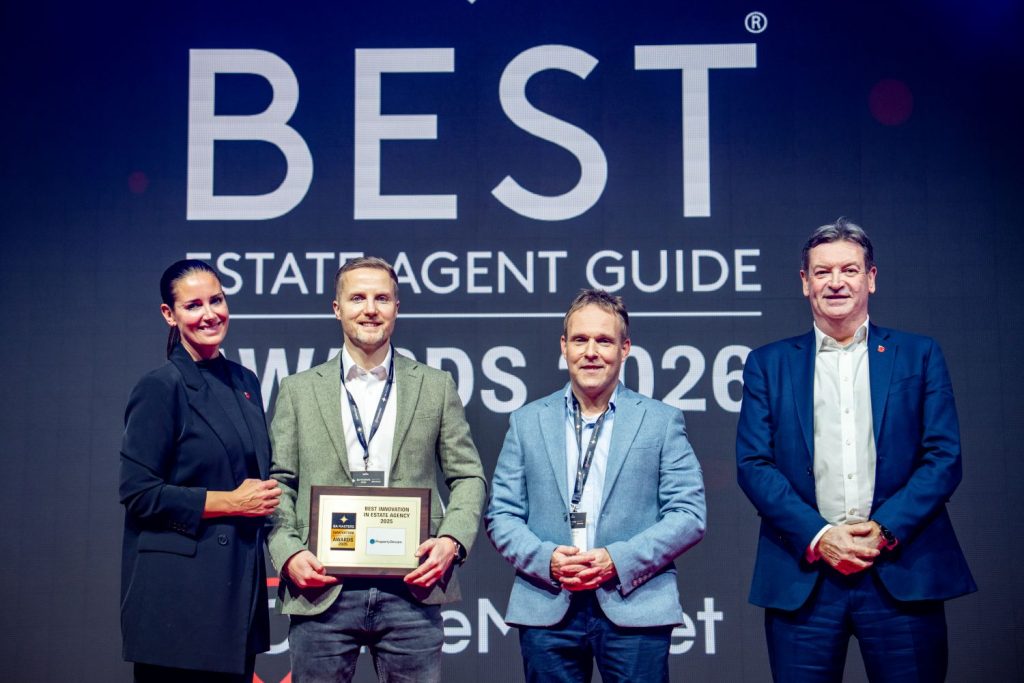 PropertyStream Directors Robin and Eddy on stage at EA Masters, collecting the award for Best Innovation In Estate Agency 2025.